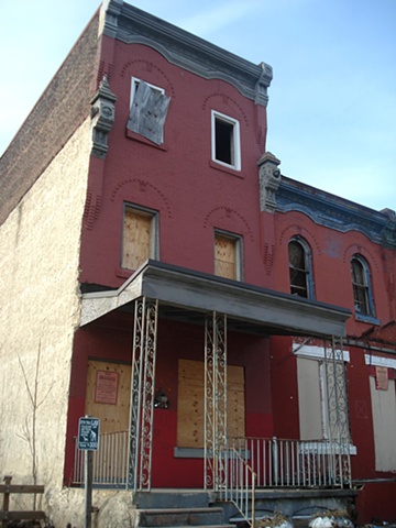 philadelphia city street abandoned red house photograph