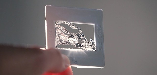 The projected images were made by the manipulation of tinfoil in a slide carrier, projected.