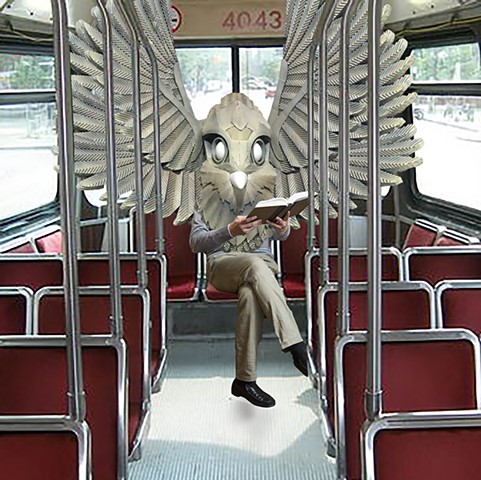 mask, cardboard, ttc, streetcar, public transit, god, book, reading book, angel