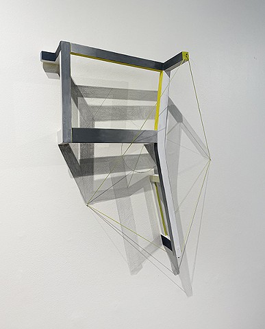 This is a sculpture made from a reconfigured found chair and wall drawing of cast shadows and negative spaces by Sheila Ghidini.