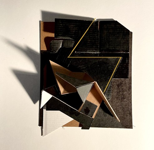 This is a three-dimensional collage, constructed from found materials.