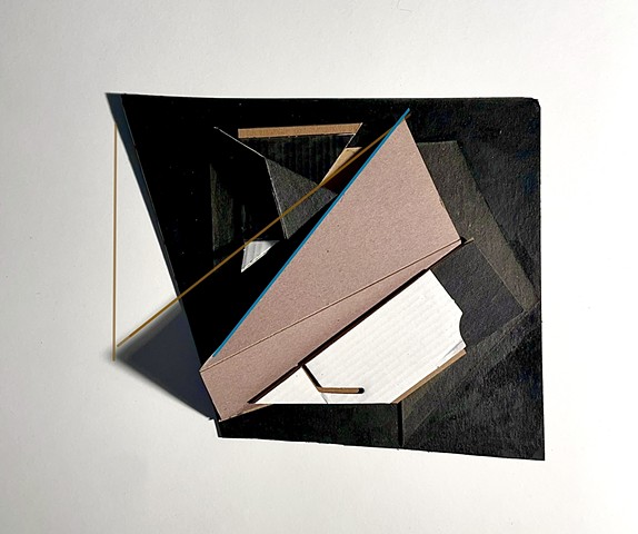 This is a three-dimensional collage, constructed of found cardboard.