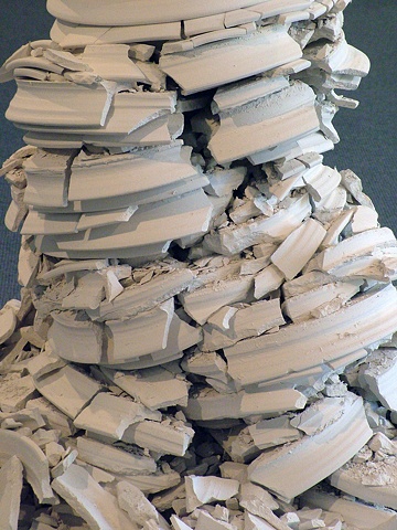 100 handmade porcelain plates, stacked (detail)