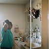 Mom in bathroom fixing her hair