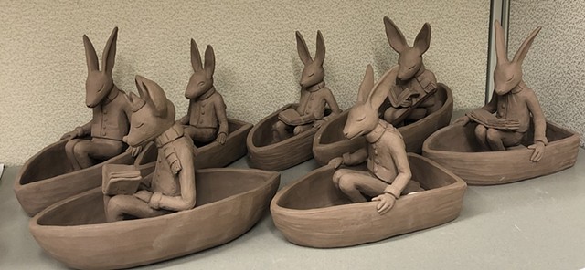 Rabbits in boats waiting to be glazed.