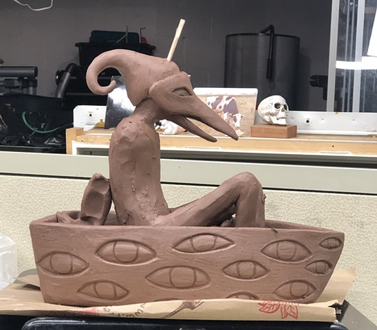 Boat figure being sculpted. 