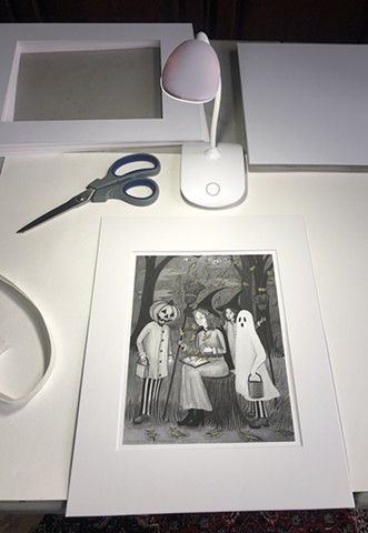 Signing and assembling Giclee prints for retail and online sale.