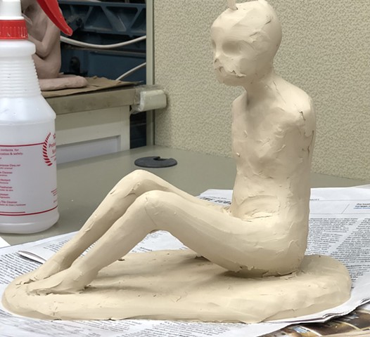Very beginning stages of developing clay figure.