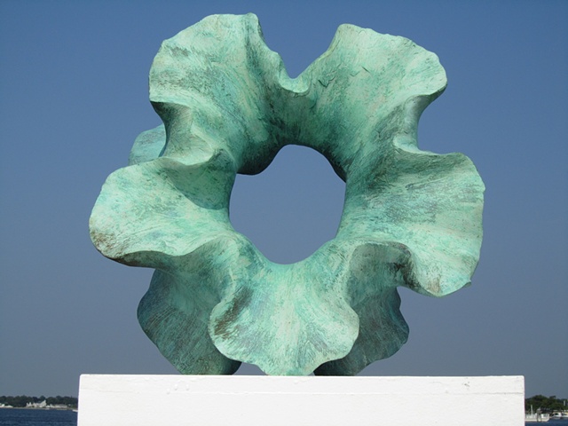 Resing over carved foam treated with copper patina