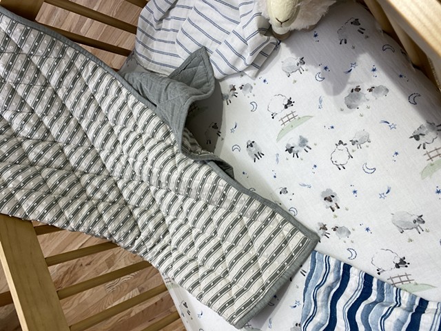 Sheep crib bedding and ticking stripe blanket