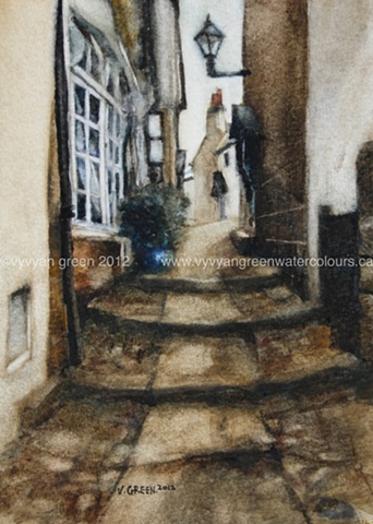 Watercolour painting of cottages in an alleyway in Robin Hood's Bay, North Yorkshire.
