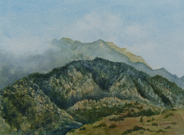 watercolor of pikes peak with cloudcover greens and ochers