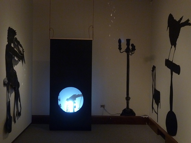  The Last Picture Show, (moving projection), roofing paper, wire, vellum scrim, spinning turntable with cut paper and taxidermy, flashlight  
