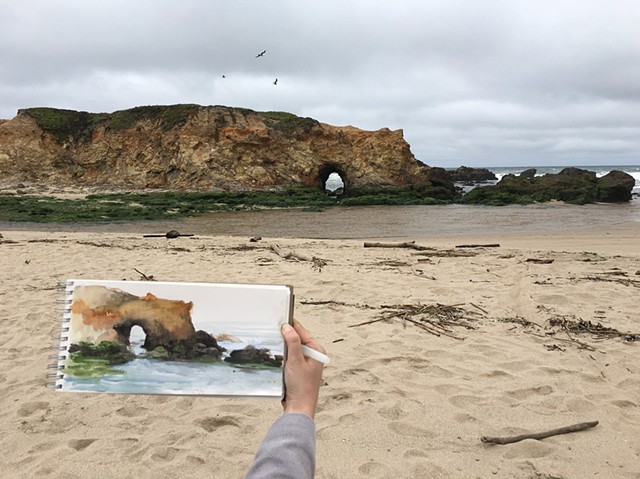 Painting the arch at Pescadero Beach, California