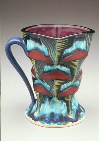 Cup with pinched foot