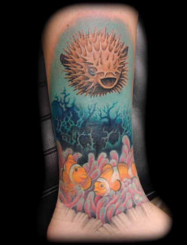 Salisbury Maryland tattoos crucial tattoo studio tattoo water puttef fish reef dolphins fish coral reef tattoos