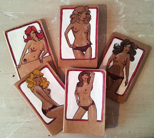 set of five moleskine cahier moleskines of pinup girls commissioned as wedding gifts for the bridesmaids.