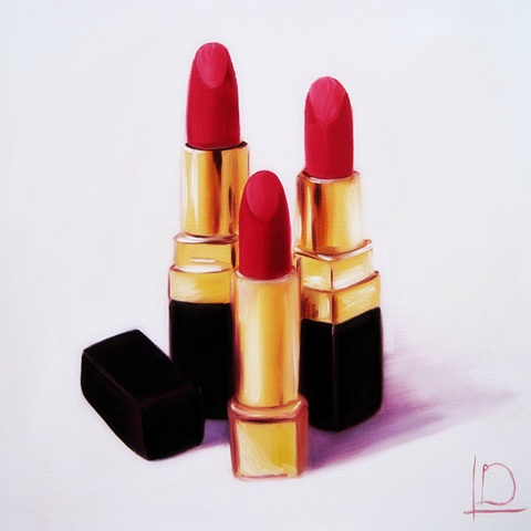 A gorgeous selection of red lipsticks in gold and black cases, painted in oils on canvas by Brighton artist Linda Boucher from her seafront studio.