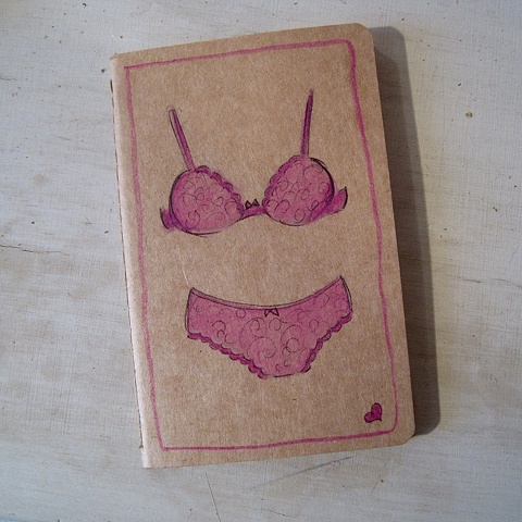 Cute Moleskine pocket sized notebook hand illustrated with pink lingerie set. Brighton based artist has created this range of notebooks for her exclusive StockingTops range of contemporary erotic art. Working from her seafront studio, Linda is best known 
