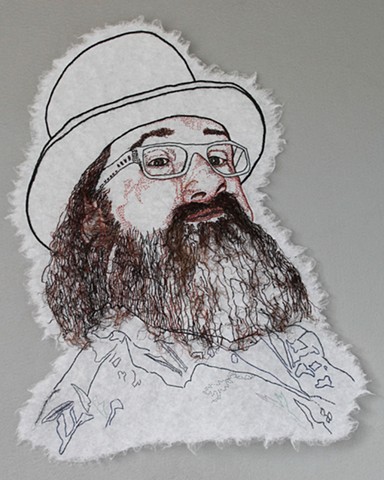 embroidery portrait of bearded menacing man