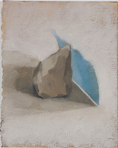 rock, blue paper