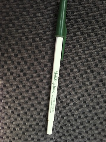 11. pen from the pocket on the driver’s side front door