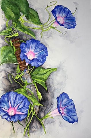 4 morning glory blooms - pink and blue - climbing up and smothering an army regulation knife