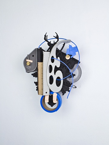 Golem #57; cuckoo clock with tools
