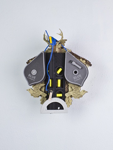 Golem #28; cuckoo clock with tools