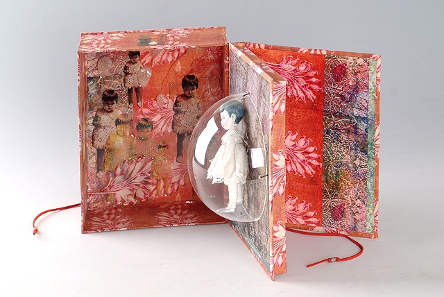 Mutted music box / 2008 / monotype, collage, digital printed images, paper clay, painting ,epoxy-resin / 6 x 8 x 4 (inches)