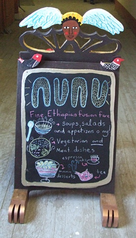 Nunu sandwich board sign - side one