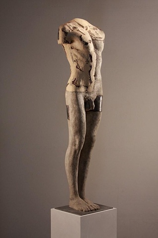 Sculptor Dan Corbin used wood and bauxite to create male form from live model.