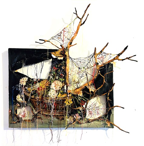 Basket of flowers with branches and spiderwebs (Unravel)