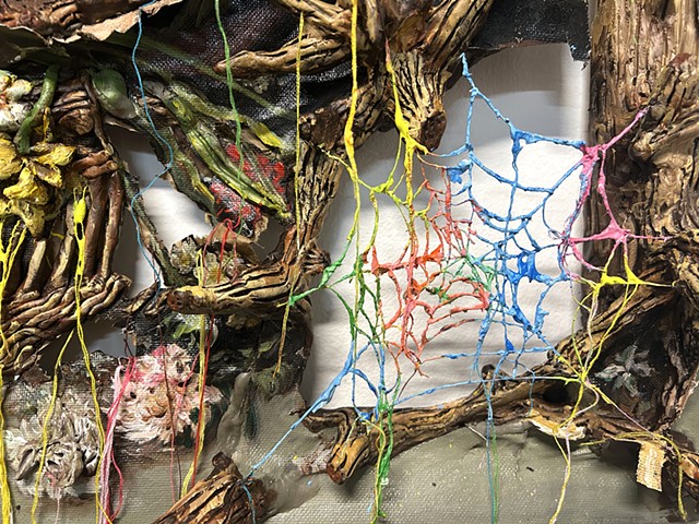 Basket of flowers with branches and spiderwebs (Unravel)