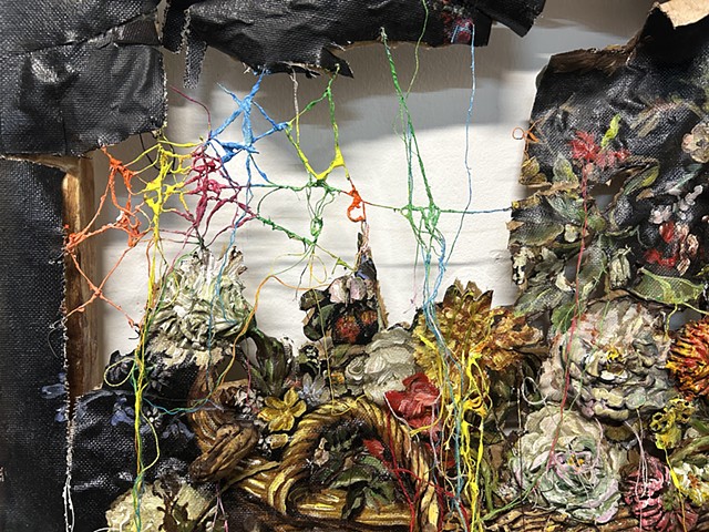 Basket of flowers with branches and spiderwebs (Unravel)