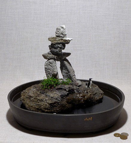 Innunguaq fountain with handmade murre figures and plants