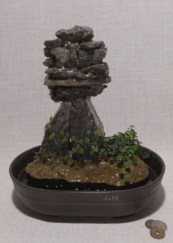 tabletop fountain with pump and live plant