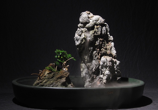 zen indoor fountain rock sculpture with jasmine, fogger, and chinese figurines