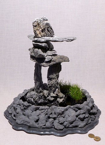 innunquaq fountain with Corian bird figure and miniature rushes