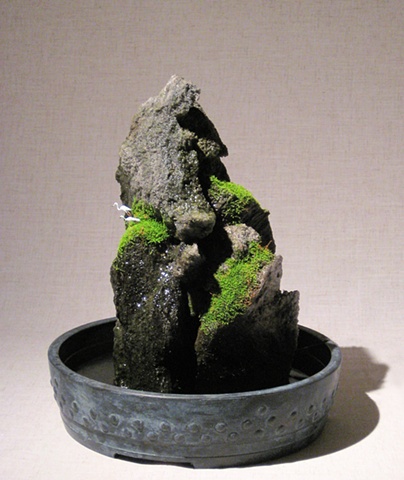 zen indoor fountain rock cairn sculpture with mosses and bird figurines