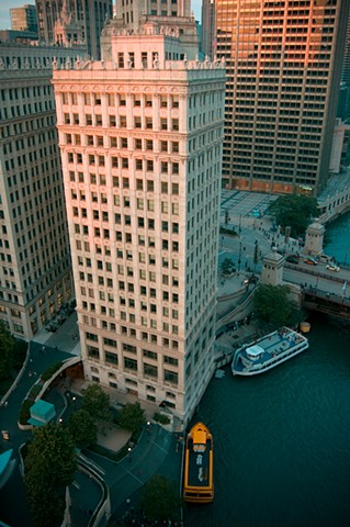 Sun setting on the Chicago River where it meets Lake Michigan taken from the balcony of Trump Tower photographed by Lucy Mueller Photography