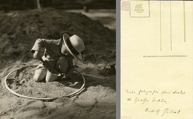 Untitled (child playing in the sand)