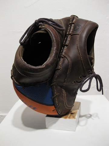 Title/Materials: Basketball, Artist's Shoes, Shoe Laces, Block of Wood, Paint