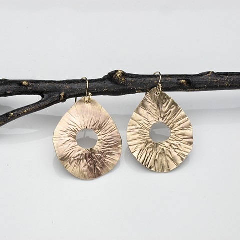 radiant lined hammered brass teardrop wave earrings on gold filled french wires. #135e