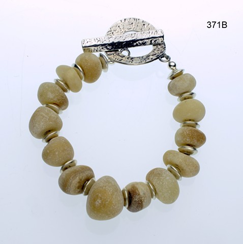 natural Afghan jade with silver beads, finished with a textured silver toggle clasp, 7" (#371B)