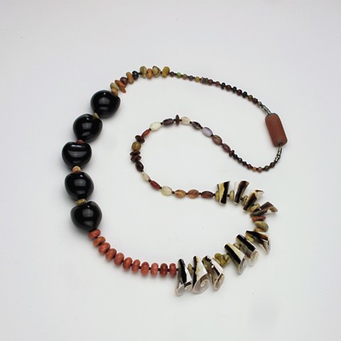 an eclectic mix of Mexican opals. kukai seeds, shells, sponge coral and tiger coral, 28" ( this necklace has no clasp, just pops over your head) (#870)