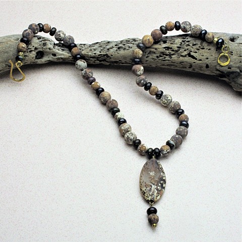 2 1/2" leopard jasper pendant hangs from a string of matte leopard jasper & polished tiger iron beads, finished with a brass hook & eye clasp (#784)