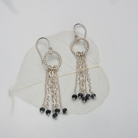 chain reaction: a quintet of chains w/ faceted iolite suspended from a twisted ring on ear wire, all sterling silver (2 ") #660E