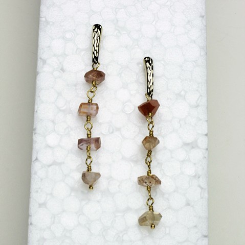 14kt yellow gold post earrings w/ wire wrapped rough faceted shades of pink sapphires (2" )
(#732E)