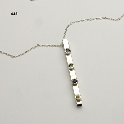 sterling silver tube pendant w/ 4 bezel set faceted stones #448